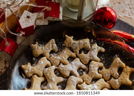 New Year's ginger biscuits on a plate in the form of a bull