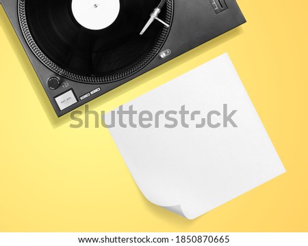 Vinyl player with long play or LP record and empty blank cover
