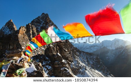 buddhist prayer flags, view from Renjo La pass - Nepal himalayas mountains Royalty-Free Stock Photo #1850874394