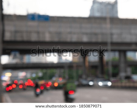 Many car on the road in evening. Traffic jam in metropolis. Blur photography for background.