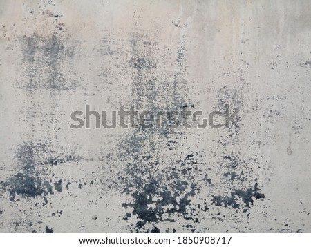 Closeup​ wall​ concrete​ texture​ for​ background. Old wall​ effected​ by​ rust​ for​ background. Cement​ wall​ for​ vintage​ background. Rust​y​ damaged​ to​ surface​ wall.