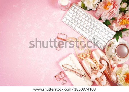 Pointe Ballet Shoes Aesthetic theme desktop workspace background on stylish pink textured background. Top view blog hero header creative composition flat lay. Negative copy space.