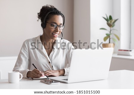Distance education. Young woman using laptop computer at home. Student girl working in her room. Work or study from home, freelance, business, creative occupation,  e-learning, lifestyle concept Royalty-Free Stock Photo #1851015100