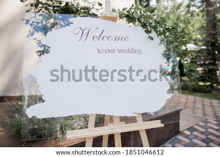 a signboard welcome to our wedding signboard