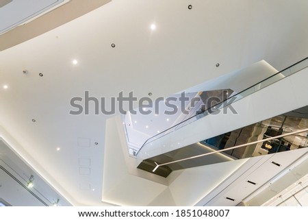 low angle view of modern shopping mall interior        