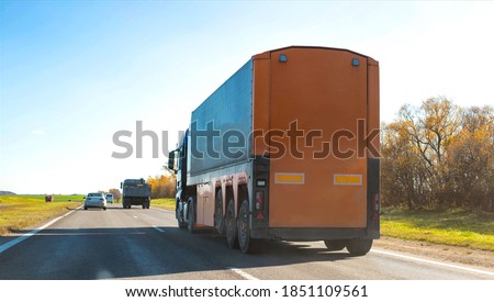 an unusual trailer for a trucker truck with a broken frame and a sloth lifting axle