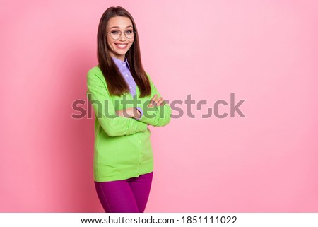 Portrait of nice attractive cheerful content girl lecturer tutor folded arms isolated over pink pastel color background