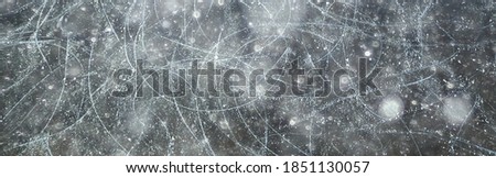 ice traces of skates texture, abstract background, top view aerial photography traces of hockey skates