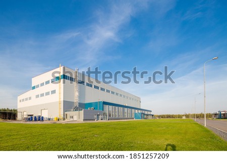 building of a modern industrial enterprise. Summer, blue sky