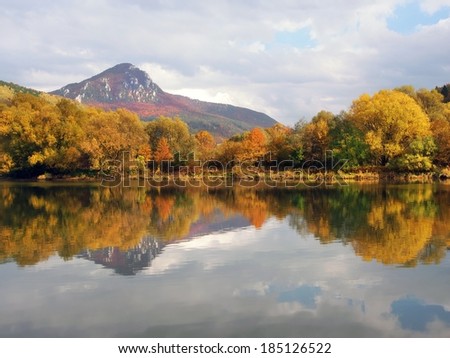 Colorful autumn view of peak of hill Sip, a massive rocky hill towering above the confluence of the Vah and Orava rivers. This hill is located in the national nature reserve of the same name.