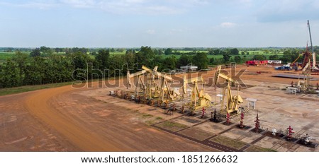 Aerial view of field oil pump jack oil rig machine for pumping natural fossil fuel, webinar banner