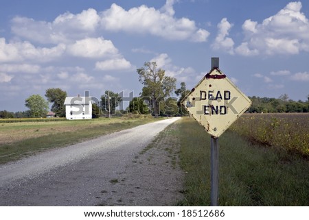 Dead End sign guards a lonely gravel road in rural Kansas