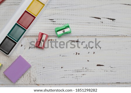 
white wooden background with stationery