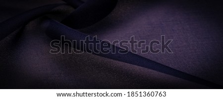 Transparent navy blue chiffon, silk, Air Force blue abstract background. Green fabric close up. - it is a soft transparent fabric with a slight roughness (matte, crepe) due to the use of twisted yarn