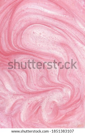 Pink liquid shimmering cosmetic product studio shot. Royalty-Free Stock Photo #1851383107