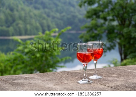Strawberry drink across the landscape