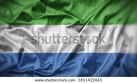 close up waving flag of Sierra Leone. flag symbols of Sierra Leone.