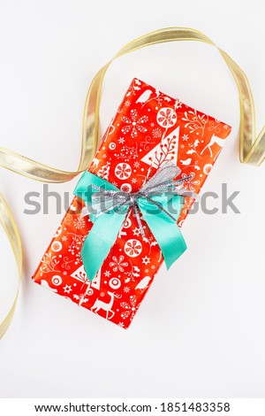 Beautifully pack New Year's gift isolated on white background. Holiday, New Year's mood