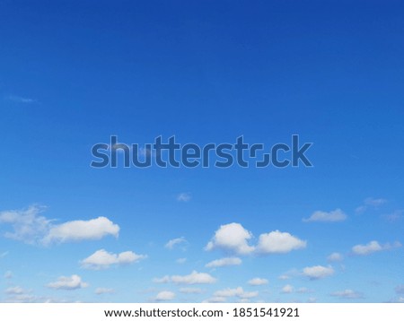 a beautiful blue sky with clouds background and texture 

