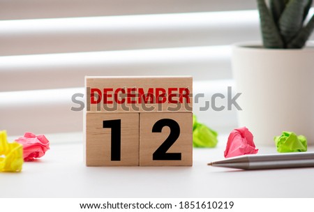 Save the Date calendar with Winter theme colors, fruit and flowers, for birthdays, special occasions, holidays, weddings, website events, or Christmas Advent calendar days, for December 12