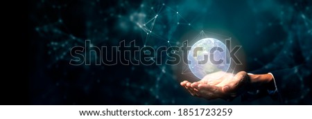 Hand on digital technology cyber space smart world metaverse, futuristic smart digital solution internet of thing wireless technology. Royalty-Free Stock Photo #1851723259