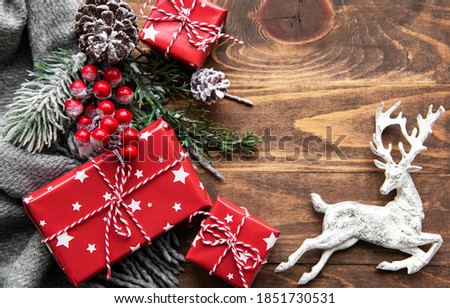 Christmas flat lay background with fir tree and decorations on old wooden background