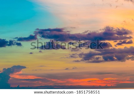 Sunset colors in heaven, natural environmental background bright orange sky and light of the sun