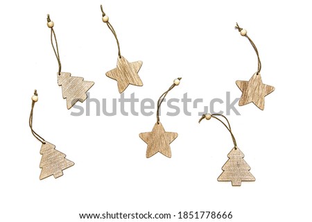 Set cristmas decorations isolated on white background, topview, flatlay. Collection of brown wooden new year stars and trees for designer. 
