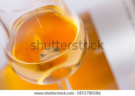 glasses and bottles with orange wine