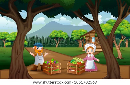 Happy farmer with the harvest in the wooden crate