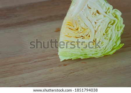Cabbage on the wooden floor.