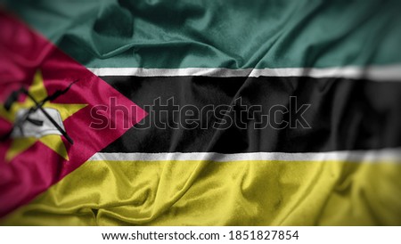 close up waving flag of Mozambique. flag symbols of Mozambique.