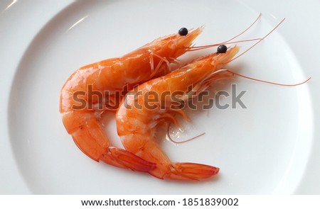 Freshly cooked prawns - shrimp on a bed of crushed ice