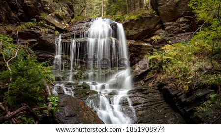 Waterfall in a forest, near Keprnik mountain, Jeseniky, Czech Republic. Royalty-Free Stock Photo #1851908974