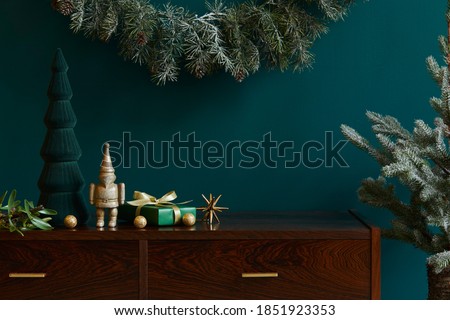 Christmas composition with decoration, christmas tree, gifts and accessories in cozy home decor. Copy space. Template.