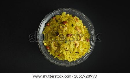 Indian snack "poha chivada" prepared and consumed during diwali festival in india.