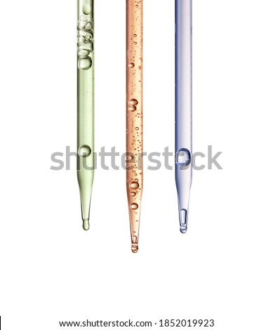 Liquid drop from cosmetic pipette close up, isolated on white background Royalty-Free Stock Photo #1852019923