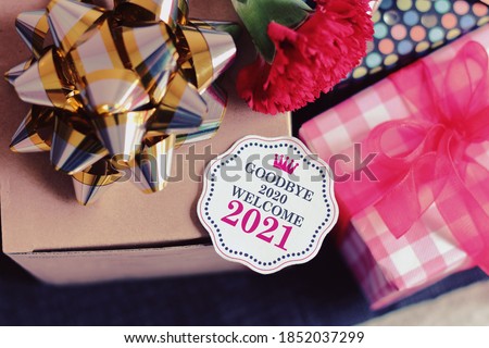 Goodbye 2020 welcome 2021 with decoration. We wish you a new year filled with wonder, peace, and meaning. Royalty-Free Stock Photo #1852037299