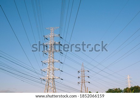 high voltage post.High-voltage tower sky sunset background.