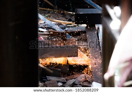 Technician welding steel structure for workshop in Bangkok ,Thailand.