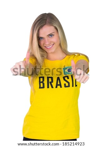 Pretty football fan in brasil tshirt on white background