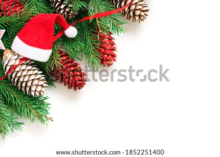 Festive fir branches with decoration and space for your advertising.
