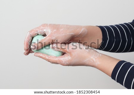 Hand washing with antibacterial soap. Prevention of coronavirus.