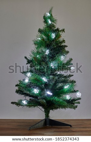 A studio photo of a christmas tree