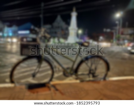 Blurred object of bicycle on tugu jogja