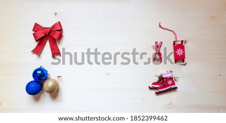 Background for New Year's inscription, natural wood, Christmas toys