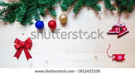 Background for New Year's inscription, natural wood, Christmas toys