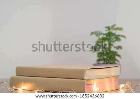 concept of reading a book is at the desk in the room