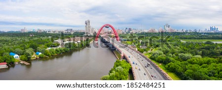 Panoramic view of Moscow on a sunny day, Russia. Picturesque region in the north-west of Moscow city. Zhivopisny bridge across the Moscow river. Royalty-Free Stock Photo #1852484251