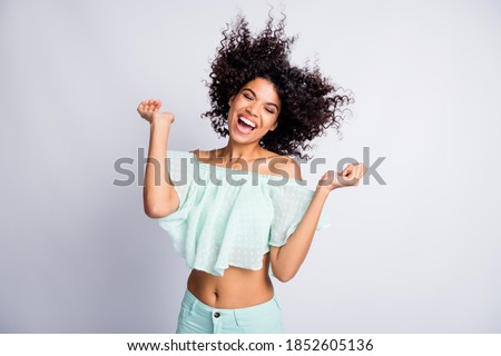 Photo portrait of laughing dancing girl isolated on white colored background
